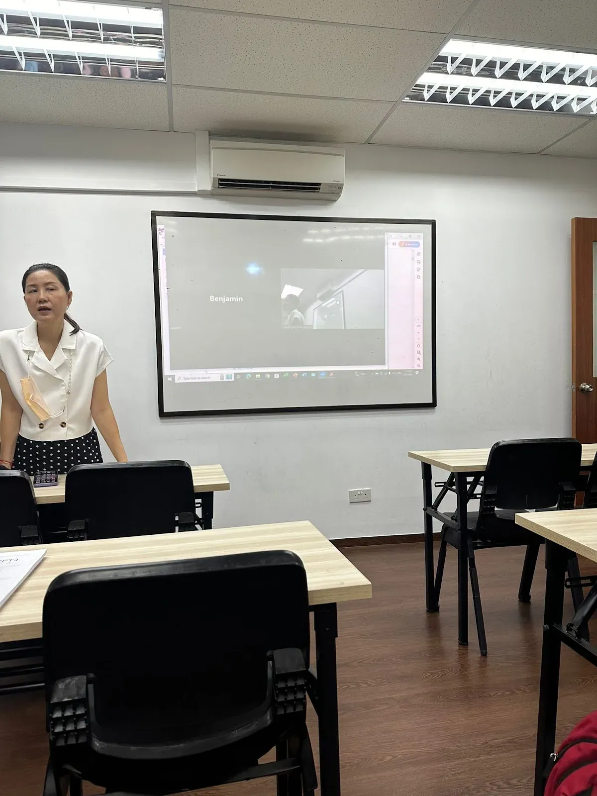 A Thai teacher taking a lesson at the city campus