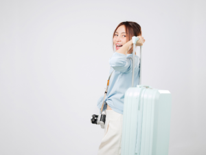 Traveler preparing for a trip while practicing essential Thai language for travel