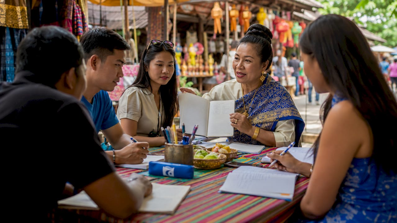 Thai teacher engaging Southeast Asian adults