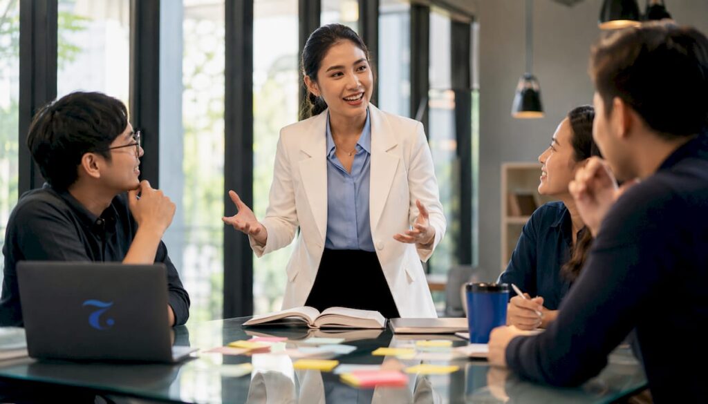 Thai businesswoman leading meeting discussion