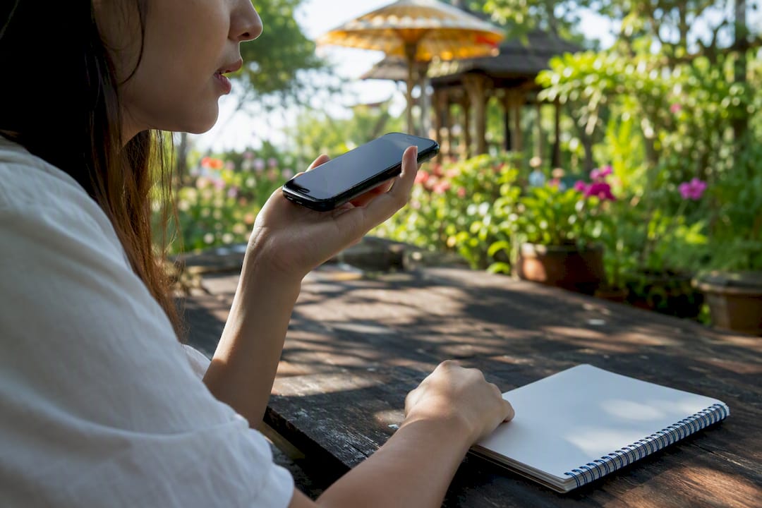 Learner practicing speaking Thai at home