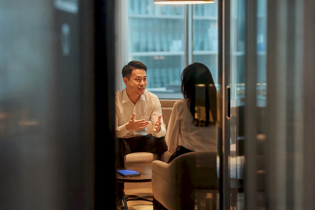 Professionals practicing Mandarin in Singapore office